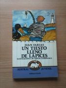 tiesto lleno de lapices, un