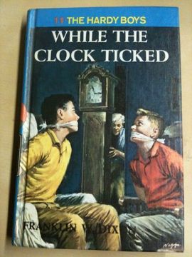 portada While the Clock Ticked (Hardy Boys, Book 11) (en Inglés)