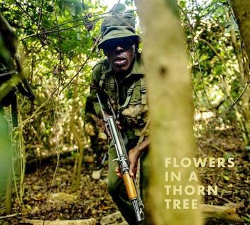 portada Steven Thackston: Flowers in a Thorn Tree: On the Road With the Warriors for Peace and Wildlife
